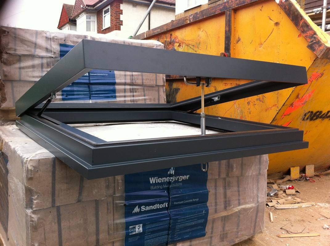 Opening flat roof skylight in anthracite grey installed in Newbury